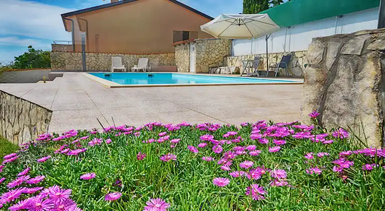 The villa with pool and garden, perfect for a family holiday