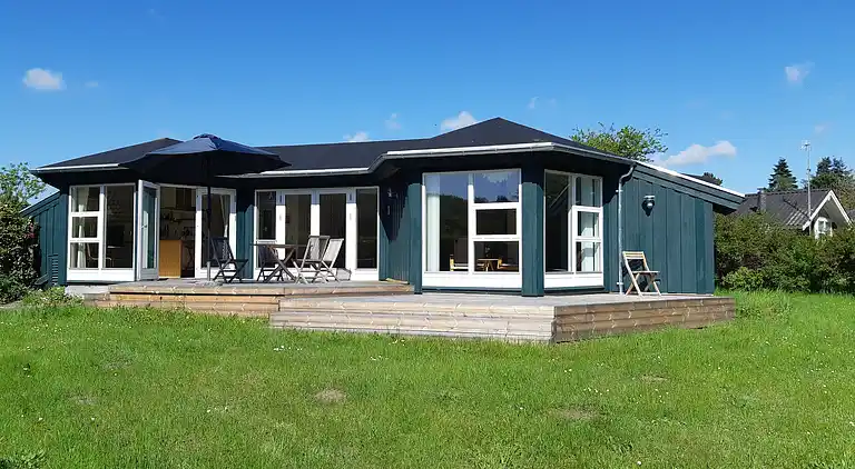 Scenic summer house near quiet lapping waves