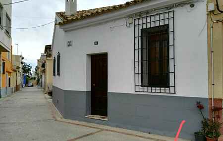 Traditional Spanish house located in a quiet coastal area.