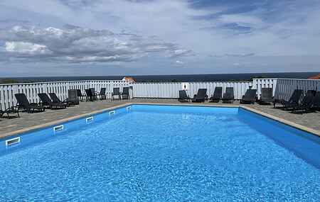 Cosy apartment with shared heated pool and a lovely view