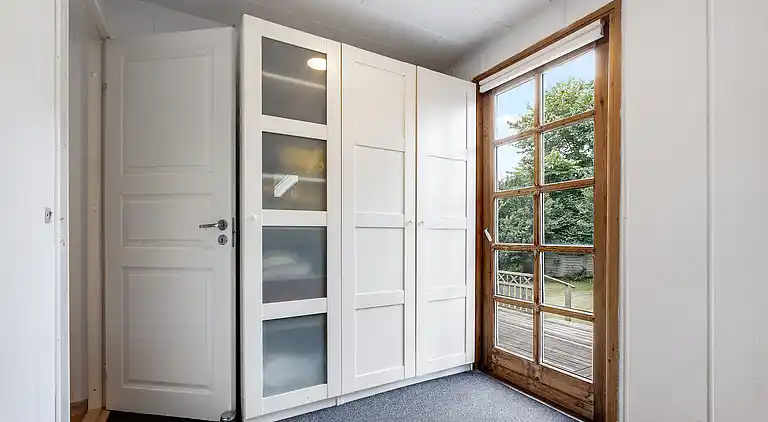 Charmerende sommerhus 450 meter fra havet