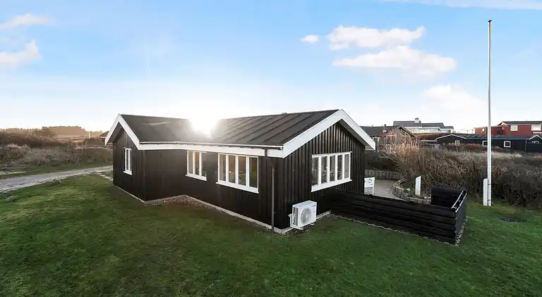 Meerblick und Ladestation für Elektroauto