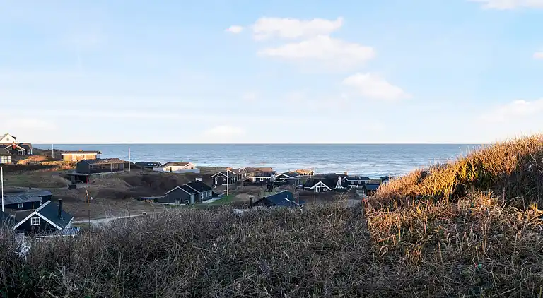 Meerblick und Ladestation für Elektroauto