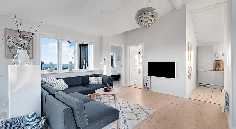 Meerblick und Ladestation für Elektroauto