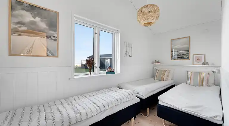 Meerblick und Ladestation für Elektroauto