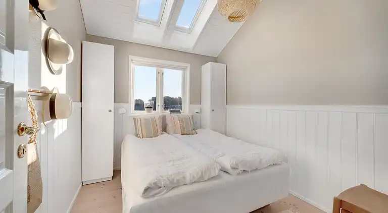 Meerblick und Ladestation für Elektroauto