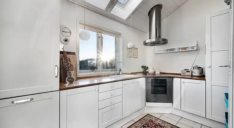 Meerblick und Ladestation für Elektroauto