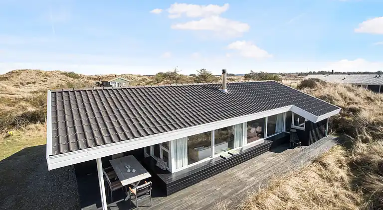 Sommerhus med havutsikt i sanddynene