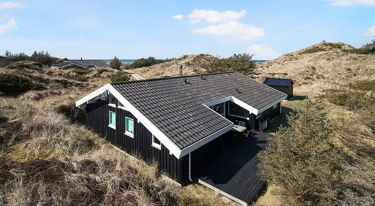 Sommerhus med havutsikt i sanddynene