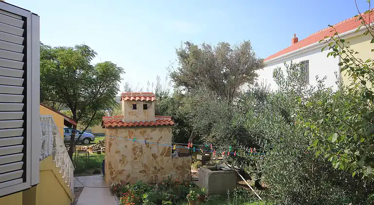 1-Zimmer-Ferienwohnung am Strand Dinjiska, Pag (A-9386-b)