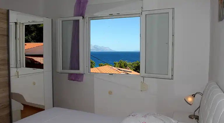 3-Zimmer-Ferienwohnung am Strand Mimice (Omis) (A-2774-b)