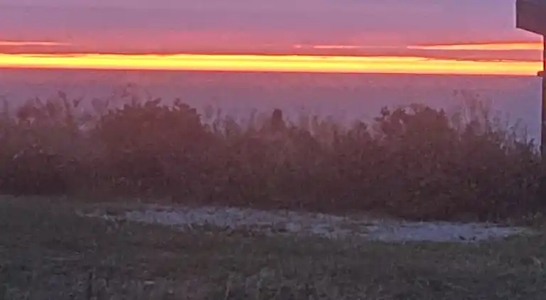 Meerblick und Ladestation für Elektroauto