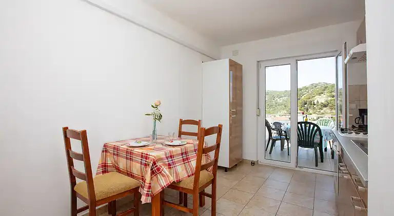 One bedroom apartment with terrace and sea view Tisno,