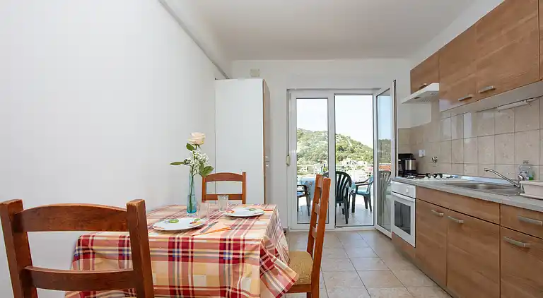 One bedroom apartment with terrace and sea view Tisno,