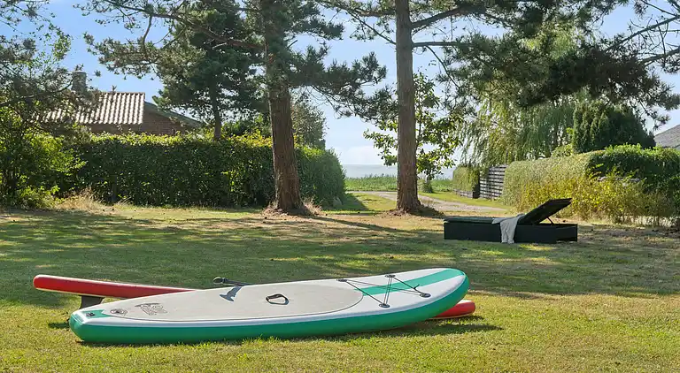 Idyllisk sommerhus få meter fra kysten