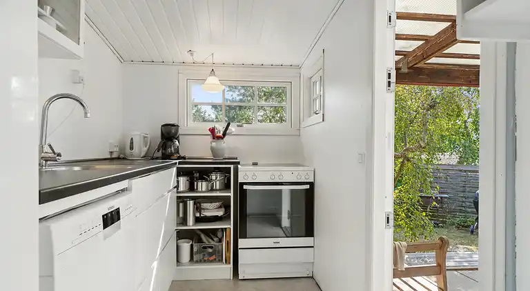 Klassisk sommerhus ved badestrand i Boderne