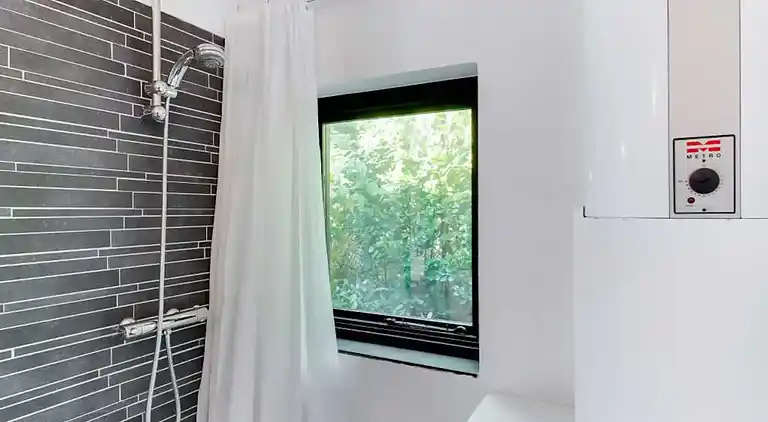 Roligt sommerhusliv kun 50 meter fra stranden