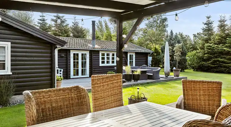 Charmerende bjælkehus tæt på vandet