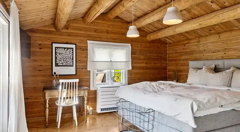 Charmerende bjælkehus tæt på vandet