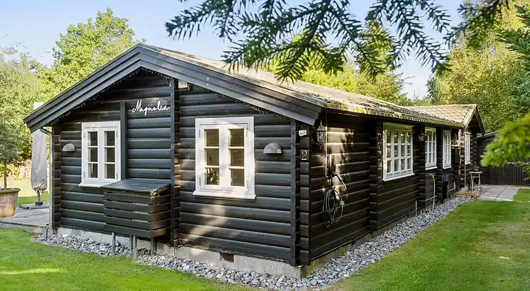 Charmerende bjælkehus tæt på vandet