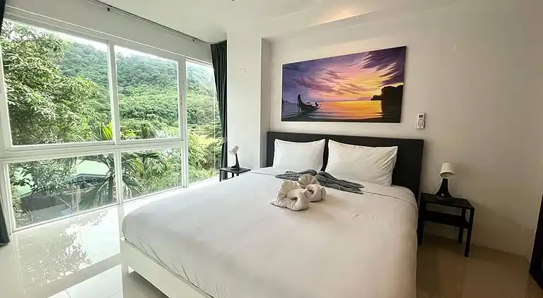 6-37 - Condo 2 chambres avec balcon et piscine partagée