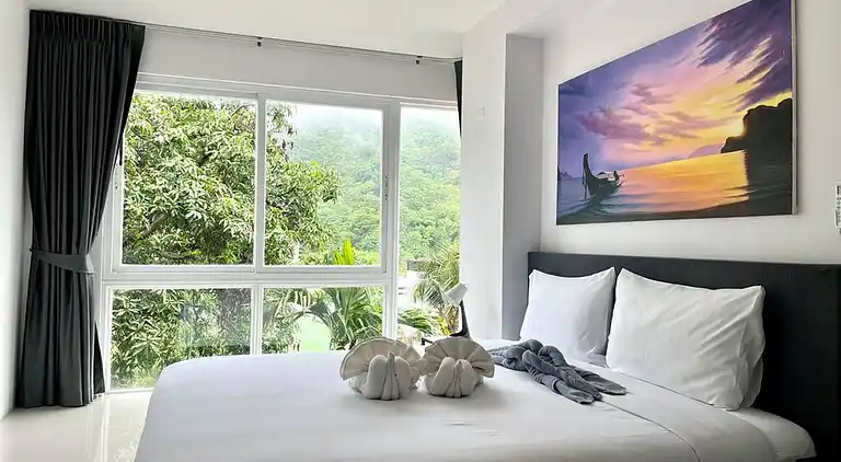 6-37 - Condo 2 chambres avec balcon et piscine partagée