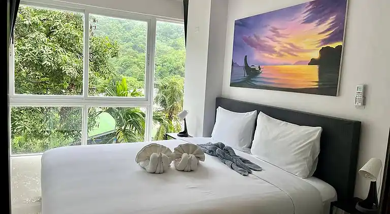 6-37 - Condo 2 chambres avec balcon et piscine partagée