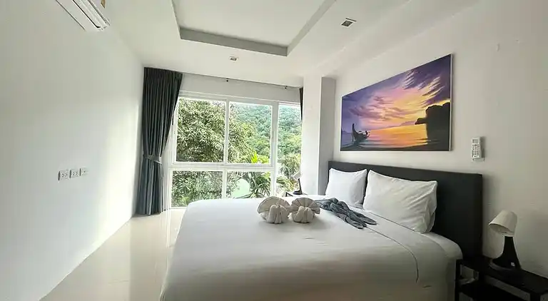 6-37 - Condo 2 chambres avec balcon et piscine partagée