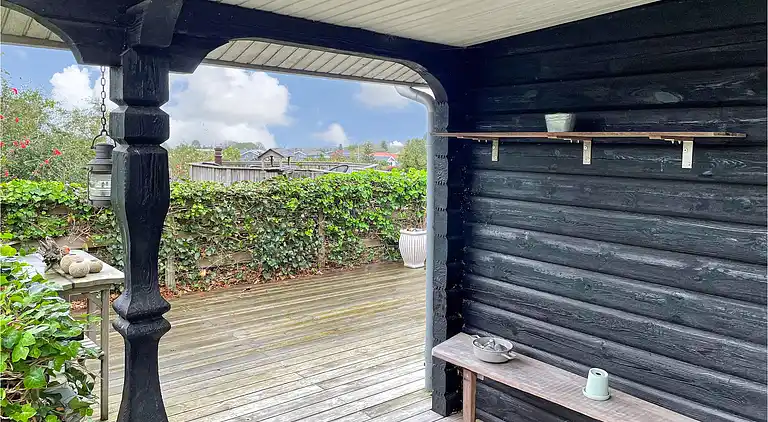 Hyggeligt bjælkehus med panoramaudsigt