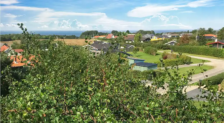 Hyggeligt bjælkehus med panoramaudsigt