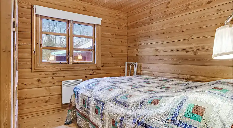 Hyggeligt bjælkehus med panoramaudsigt