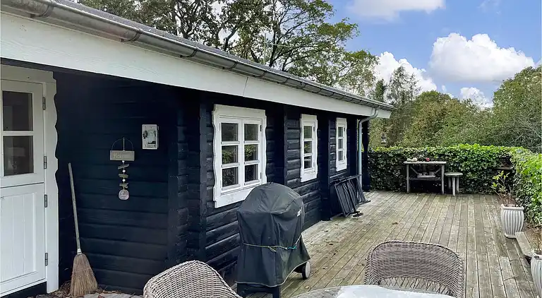 Hyggeligt bjælkehus med panoramaudsigt