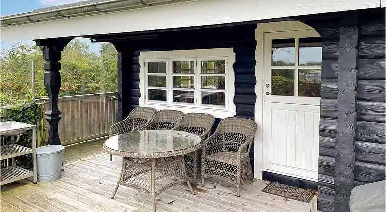 Hyggeligt bjælkehus med panoramaudsigt