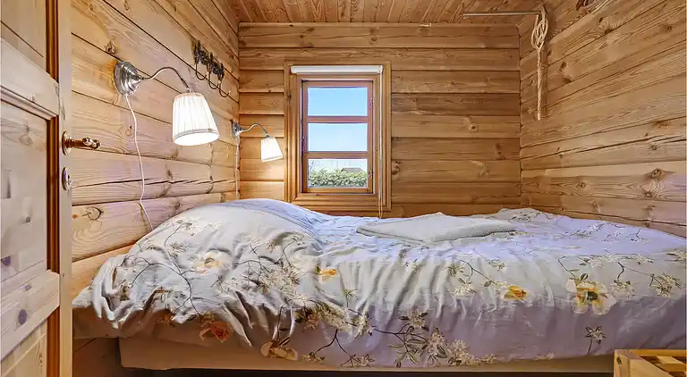 Hyggeligt bjælkehus med panoramaudsigt