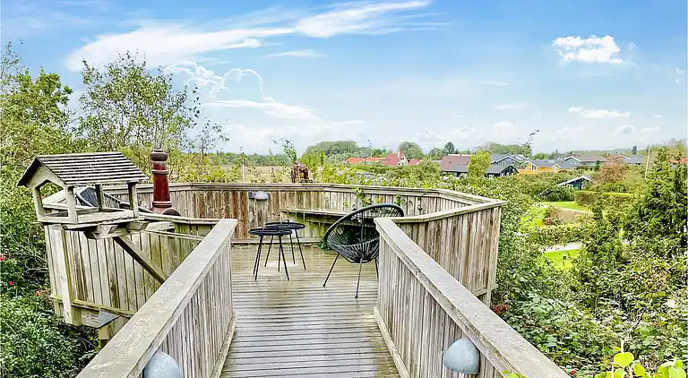 Hyggeligt bjælkehus med panoramaudsigt