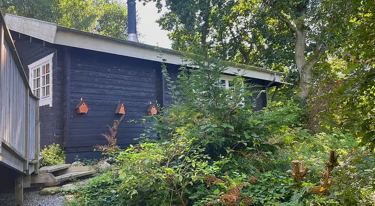 Hyggeligt bjælkehus med panoramaudsigt