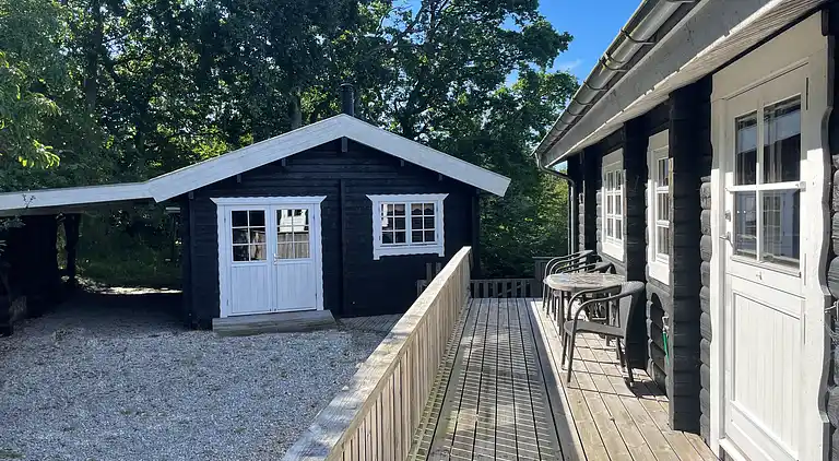 Hyggeligt bjælkehus med panoramaudsigt