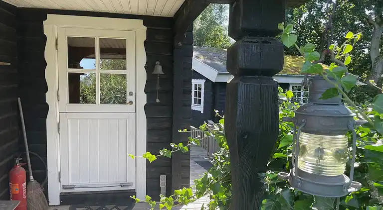 Hyggeligt bjælkehus med panoramaudsigt