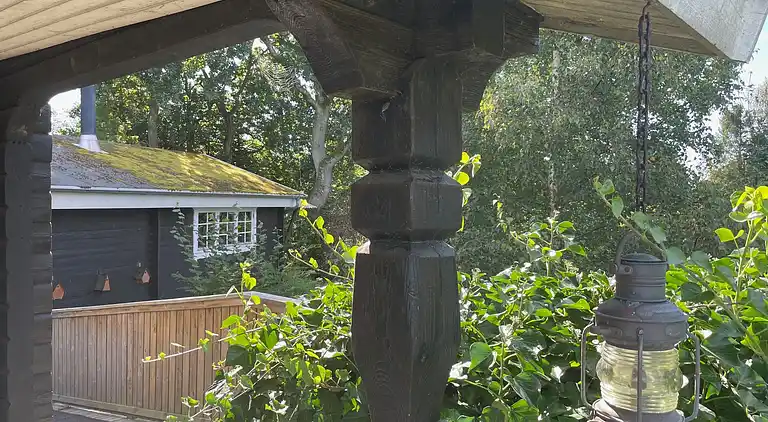 Hyggeligt bjælkehus med panoramaudsigt