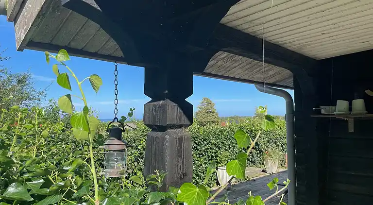 Hyggeligt bjælkehus med panoramaudsigt