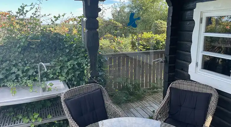 Hyggeligt bjælkehus med panoramaudsigt