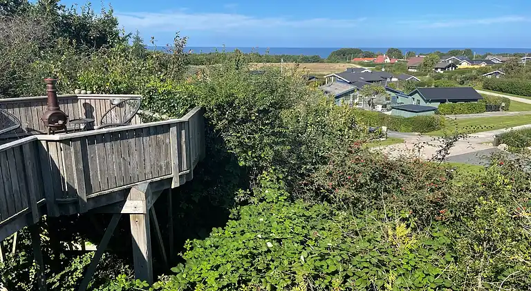 Hyggeligt bjælkehus med panoramaudsigt