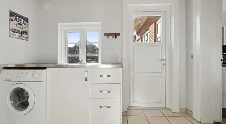 Ferienhaus mit Blick auf Meer und Hafen