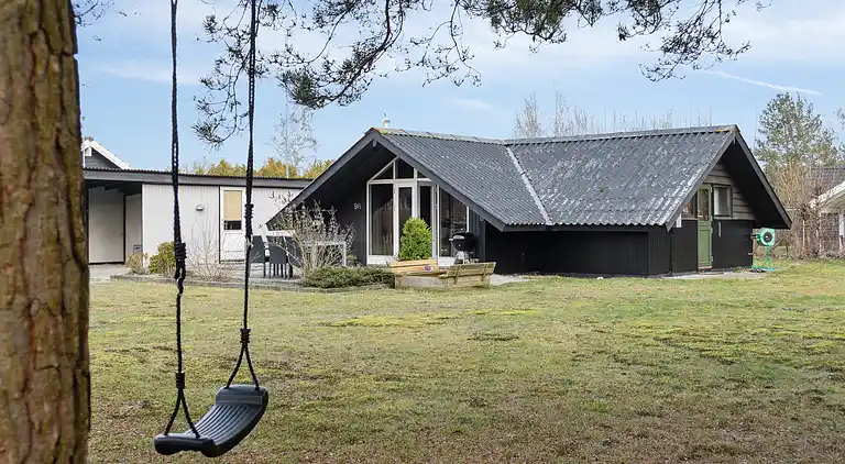 hyggeligt sommerhus med personlig indretning