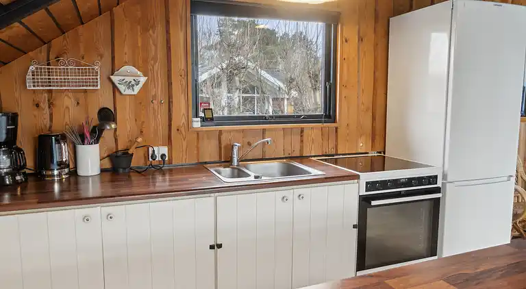 hyggeligt sommerhus med personlig indretning