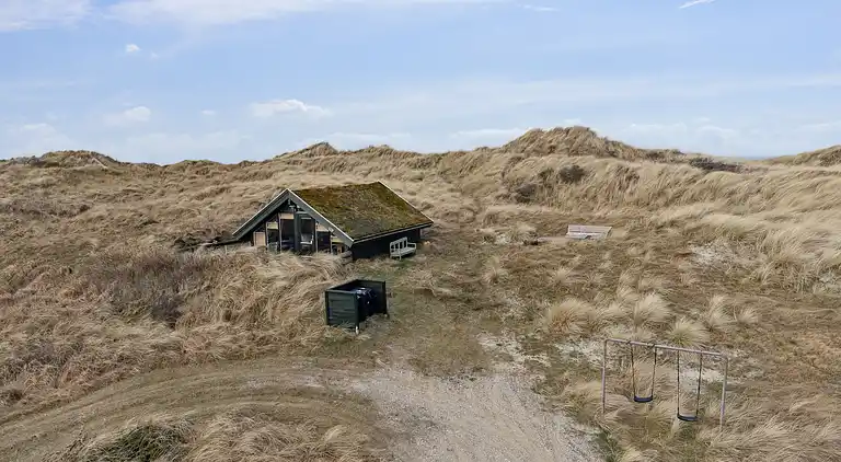 Sommerhausidylle in der ersten Dünenreihe