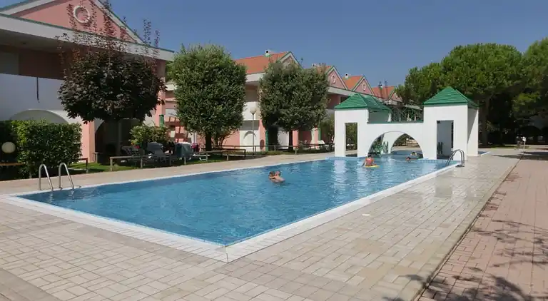 Spacious apartment with terrace and pool in Bibione