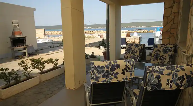 Two bedroom apartment with terrace and sea view Neviđane,