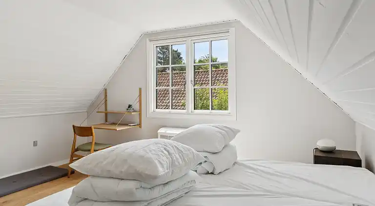 Ferieidyl i Sandvig med havudsigt