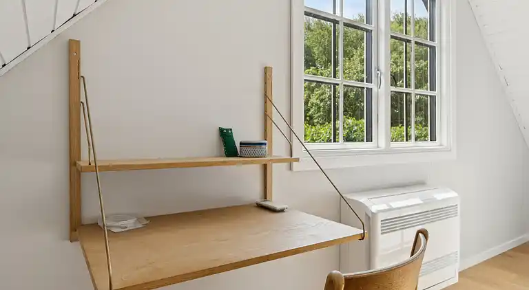 Ferieidyl i Sandvig med havudsigt